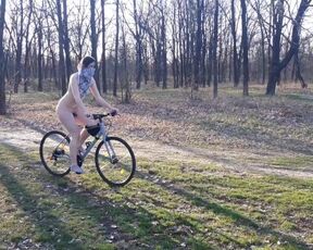 Peeping on a Naked Girl on a Bike