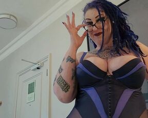 BBW MiLF with big tits and tattoos gives pierced cock a hand job.