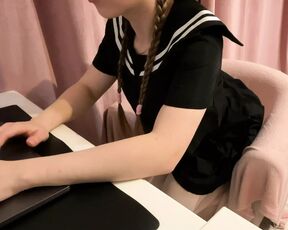 Cute Girl Masturbates in School Uniform Through Pantyhose While Watching Porn